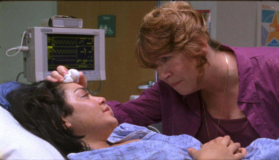 This image released by Roadside Attractions shows Vanessa Hudgens, left, and Ann Dowd in a scene from "Gimme Shelter." (AP Photo/Roadside Attractions)