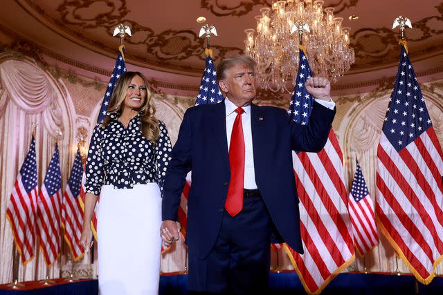 Joe Raedle/Getty Former President Donald Trump, holding hands with wife Melania Trump, announces his third presidential campaign at Mar-a-Lago on Nov. 15, 2022