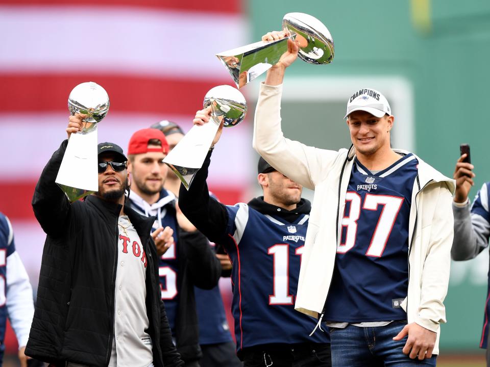 Apr 9, 2019; Boston, MA, USA; Retired New England Patriots player Rob Gronkowski holds up a Lombardi Trophy before a game between the Boston Red Sox and the Toronto Blue Jays at Fenway Park. Mandatory Credit: Brian Fluharty-USA TODAY Sports