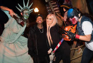 <p>Nothing scares Tyga and Kylie Jenner! The lovebirds were all smiles while wandering around at Universal Studios’ Halloween Horror Nights. We’re sure they took some selfies, too. (Photo: Mike Danenberg/Universal Studios Hollywood) </p>