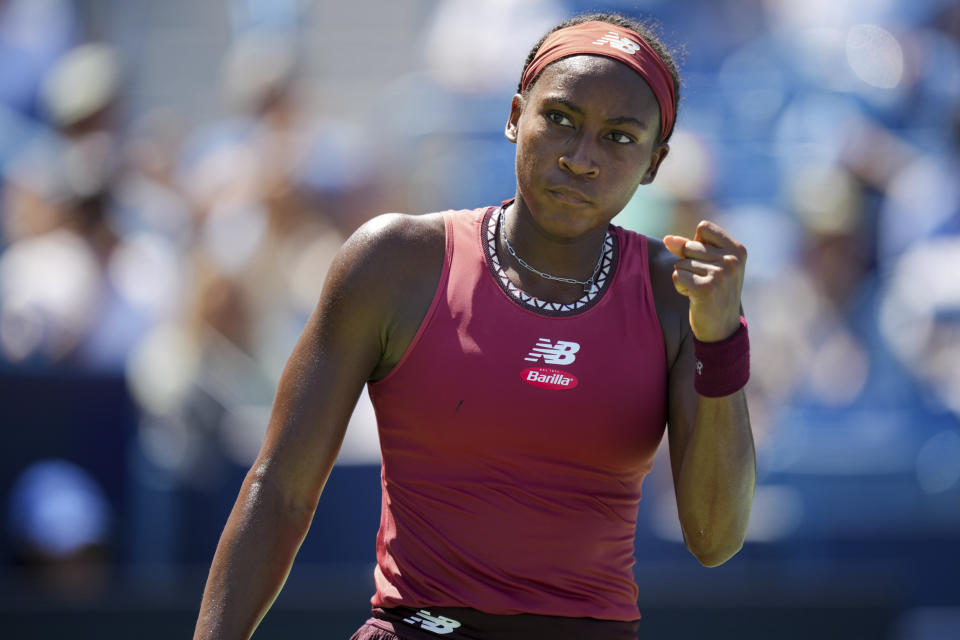 Coco Gauff, of the United States, fist pumps after winning a point to Karolina Muchova, of the Czech Republic, during the women's singles final of the Western & Southern Open tennis tournament, Sunday, Aug. 20, 2023, in Mason, Ohio. (AP Photo/Aaron Doster)