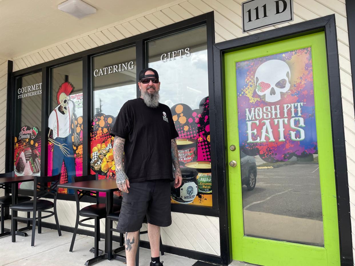 Jason Parrish stands outside Mosh Pit Eats, which he and his wife, Amber, hope to expand into an adjacent storefront to add between 30 and 40 seats for indoor dining, Friday, May 24, 2024.