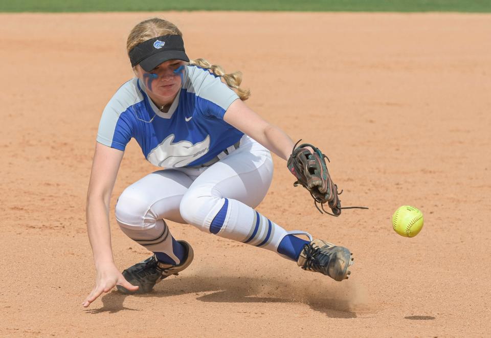 Deltona's Sophie Strempel (16) catches a ball in the infield at the Class 5A state championship game at Legends Way Ball Fields in Clermont on Thursday.
