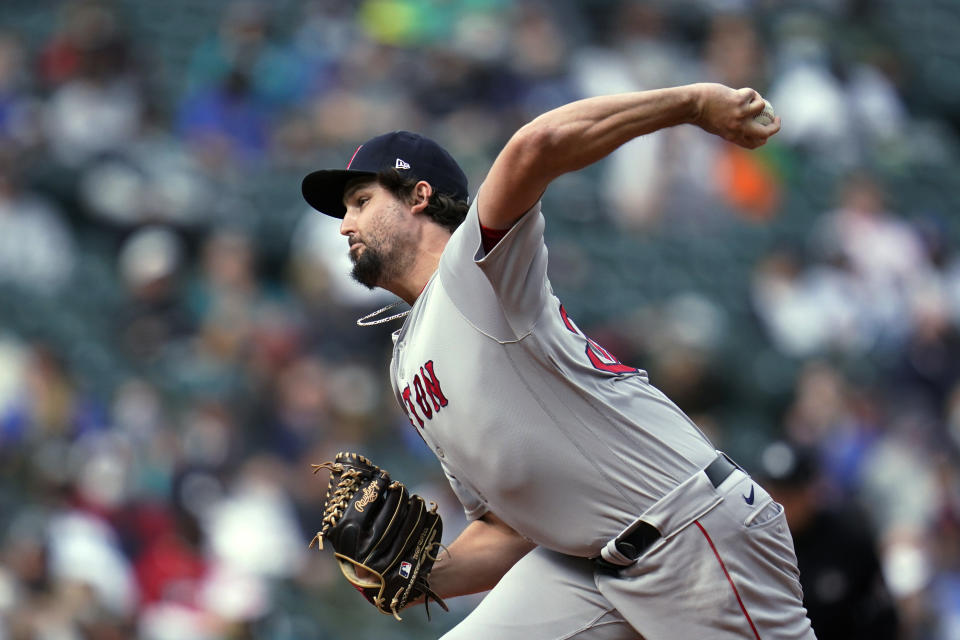 Boston Red Sox relief pitcher Josh Taylor throws to a Seattle Mariners batter during the fifth inning of a baseball game Wednesday, Sept. 15, 2021, in Seattle. (AP Photo/Elaine Thompson)