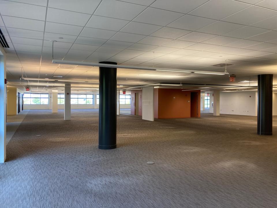 An interior view shows vacant office space inside the Crescent Building at 12421 Meredith Drive in Urbandale. With the help of a city tax increment financing rebate, R&R Realty is renovating common spaces in the building in a bid to attract more tenants.