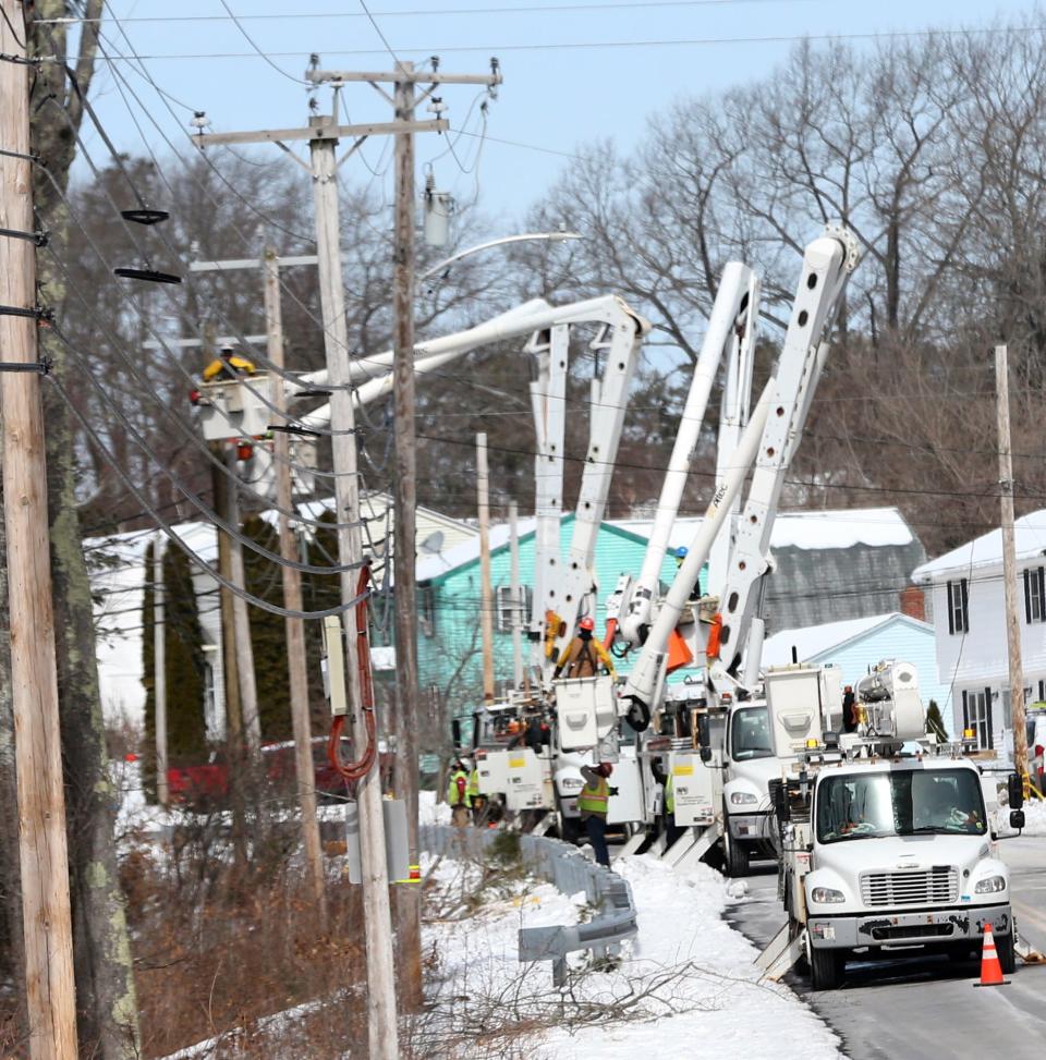 Line crews remained busy on Twombley Road in Sanford Monday, March 25, 2024, as they try to restore power to residents following an ice storm on Saturday.