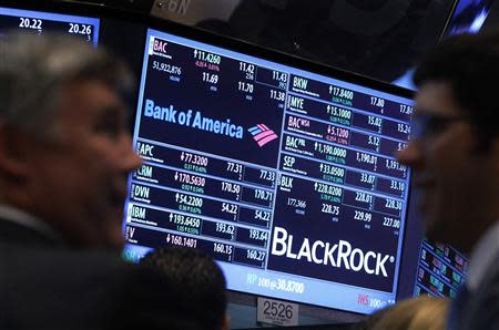 A screen displays the trading price for Bank of America and Black Rock stocks on the floor of the New York Stock Exchange, in this January 17, 2013, file photo. REUTERS/Brendan McDermid/Files