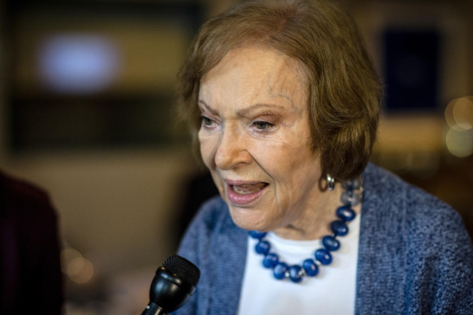 The former first lady Rosalynn Carter speaks to the press at conference at The Carter Center, Tuesday, Nov. 5, 2019, in Atlanta. Carter enjoyed a light lunch in the audience as a panel discussion led by Judy Woodruff, anchor of PBS NewsHour, took center stage. The former First Lady made remarks about her upbringing as a caregiver and the health of her husband, former President Jimmy Carter. (AP Photo/ Ron Harris)