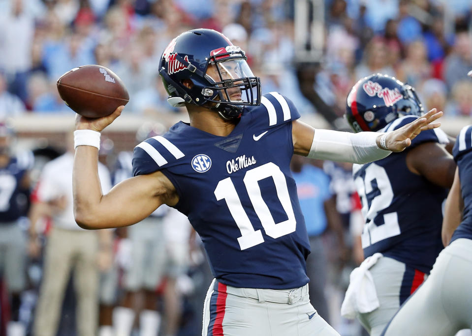 Mississippi quarterback Jordan Ta'amu (10) passes for a 79-yard touchdown against Alabama during the first half of their NCAA college football game, Saturday, Sept. 15, 2018, in Oxford, Miss. (AP Photo/Rogelio V. Solis)