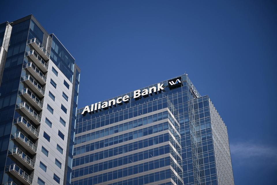 Western Alliance Bank signs are displayed at Western Alliance Bancorp's headquarters in downtown Phoenix, Arizona, on April 27, 2023. - Shares in leading US banks, including JPMorgan Chase, fell in late morning trading in New York on Tuesday.  Meanwhile, regional banks suffered massive declines.  Backwest Bancorp shares fell about 35 percent, while Comerica shares lost 13.6 percent.  (Photo by Patrick T Fallon/AFP) (Photo by Patrick T Fallon/AFP via Getty Images)