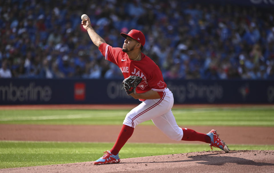 Toronto Blue Jays' starting pitcher Jose Berrios throws to a Baltimore Orioles batter in first inning of a baseball game in Toronto, Saturday, Sept. 17, 2022. (Jon Blacker/The Canadian Press via AP)