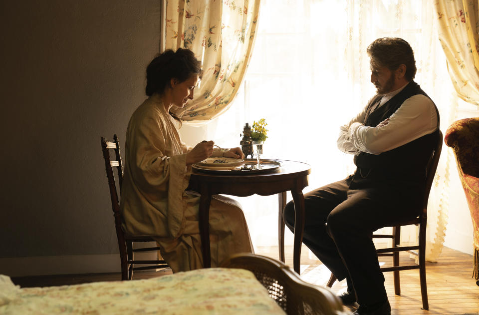 This image released by IFC Films shows Juliette Binoche, left, and Benoît Magimel in a scene from "The Taste of Things." (Stéphanie Branchu/IFC Films via AP)