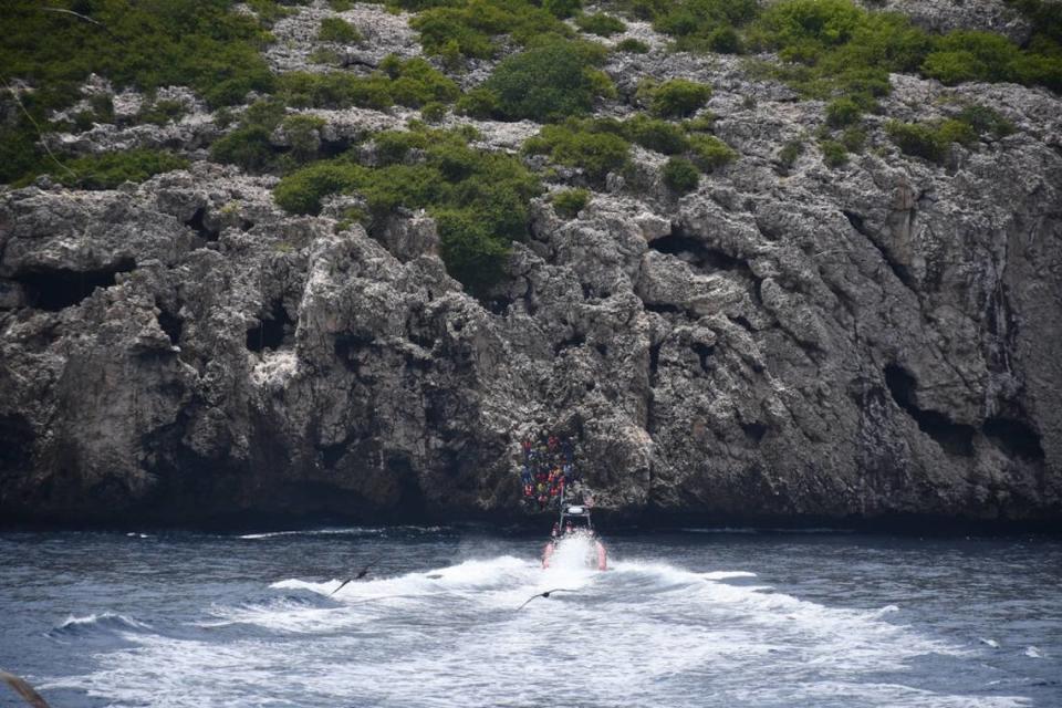 The Coast Guard Cutter Winslow Griesser rescues 48 Haitian migrants stranded on Monito Cay, Puerto Rico in the Mona Passage on Aug. 12, 2021.