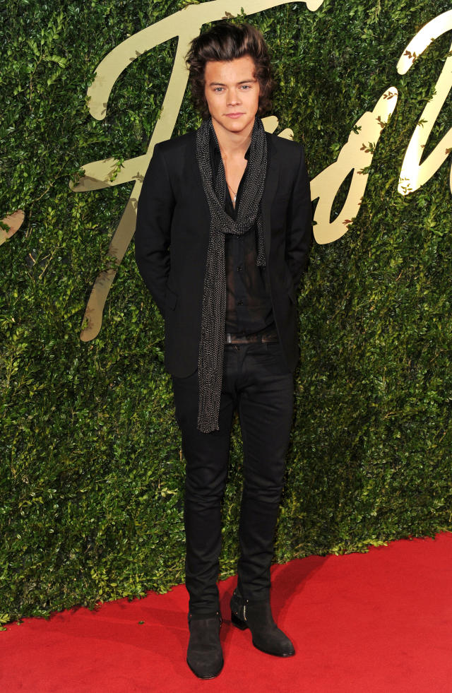 As One Direction's Harry Styles turns 21, FEMAIL looks at his  transformation