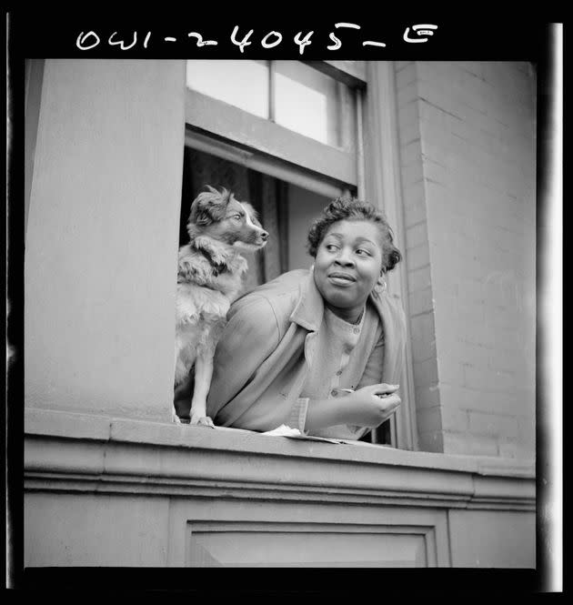 A woman and her dog, 1943, by Gordon Parks, displayed at the 