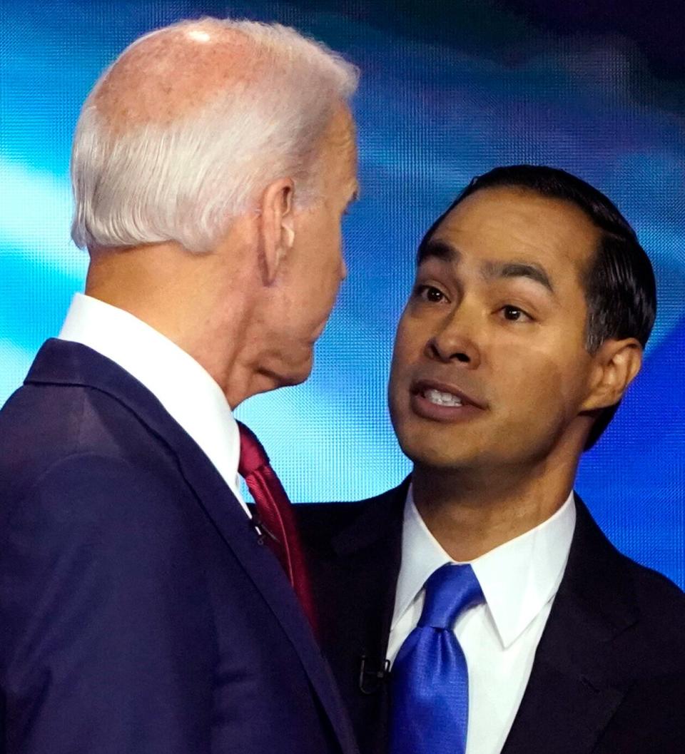 Joe Biden and Julian Castro talk after the Democratic debate on Sept. 12 in Houston, where the pair clashed over health care. (Photo: Mike Blake / Reuters)