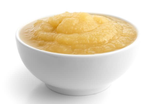 <p>getty</p> Stock image of white ceramic dish of apple sauce