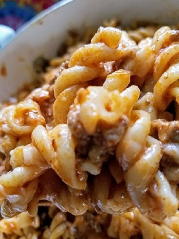 <p>Moore or Less Cooking</p><p>Taco night meets pasta night! </p><p><strong>Get Recipe: </strong><a href="https://mooreorlesscooking.com/cheesy-taco-pasta/" rel="nofollow noopener" target="_blank" data-ylk="slk:Cheesy Taco Pasta;elm:context_link;itc:0;sec:content-canvas" class="link "><strong>Cheesy Taco Pasta</strong></a></p>