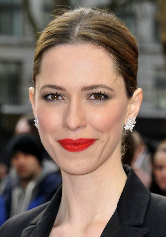 Celebrities wearing red lipstick: <a href="http://uk.lifestyle.yahoo.com/side-boob-is-the-%E2%80%98biggest-bra-fashion-faux-pas%E2%80%99-101640856.html" data-ylk="slk:Rebecca Hall;elm:context_link;itc:0;sec:content-canvas;outcm:mb_qualified_link;_E:mb_qualified_link;ct:story;" class="link  yahoo-link">Rebecca Hall</a> completed her beauty look with a slick of matte red lipstick at the Iron Man 3 London premiere.<br><br>[Rex]