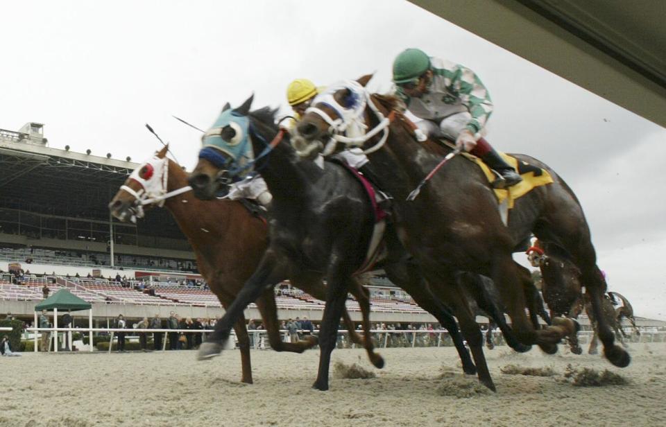 Hall of Fame jockey Russell Baze rides Two Step Cat to a win at Golden Gate Fields during the track's 10,000th race.