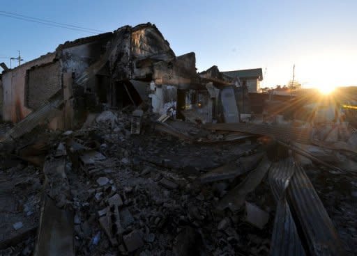 A general view shows damage caused to buildings on South Korea's Yeonpyeong Island on December 3, 2010 following a North Korean artillery and rocket attack. The South plans to hold several commemorative events over the next few days on Yeonpyeong island near the disputed Yellow Sea border and will conduct a military drill in the area on Friday