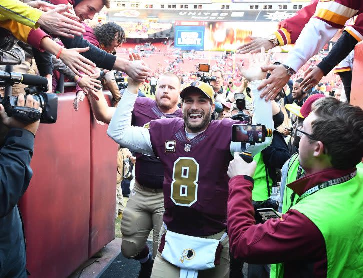 Nov 13, 2016; Landover, MD, USA; Washington Redskins quarterback Kirk Cousins (8) is congratulated by fans after the game against the Minnesota Vikings at FedEx Field. The Washington Redskins won 26 - 20. Mandatory Credit: Brad Mills-USA TODAY Sports