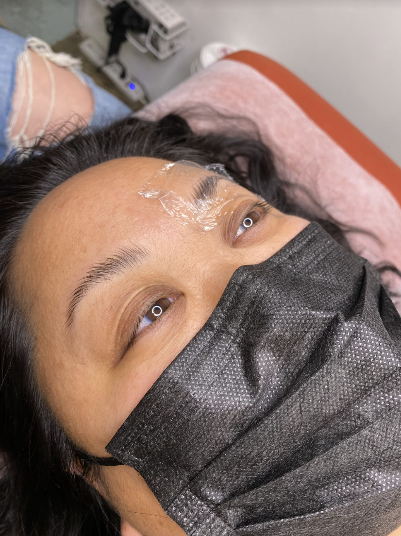 A close-up of Crystal's brows during the treatment