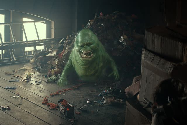 <p>Courtesy of Sony Pictures</p> Slimer in a trash pile in 'Ghostbusters: Frozen Empire.'