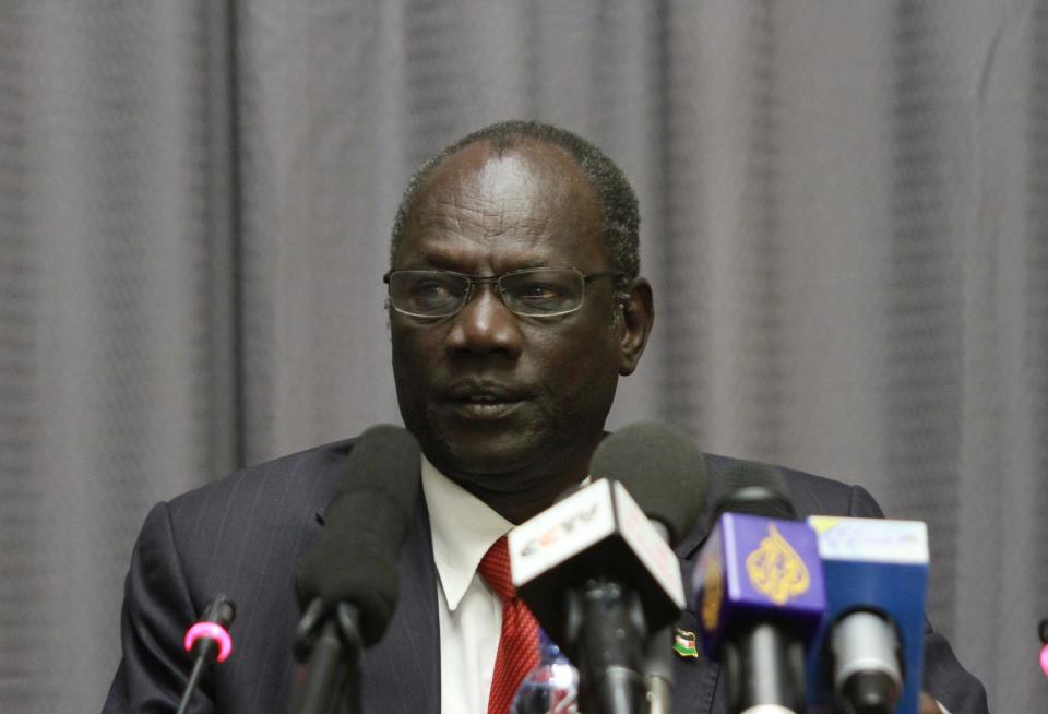 South Sudanese information minister, Michael Makuei Lueth attends a press conference in Addis Ababa, Ethiopia, Sunday Jan. 5, 2014. Lueth threatened to apprehend Rebecca Nyandeng de Mabior, the widow of former SPLM, the late John Garang, as she is spreading “negative propaganda.” (AP Photo/Elias Asmare)