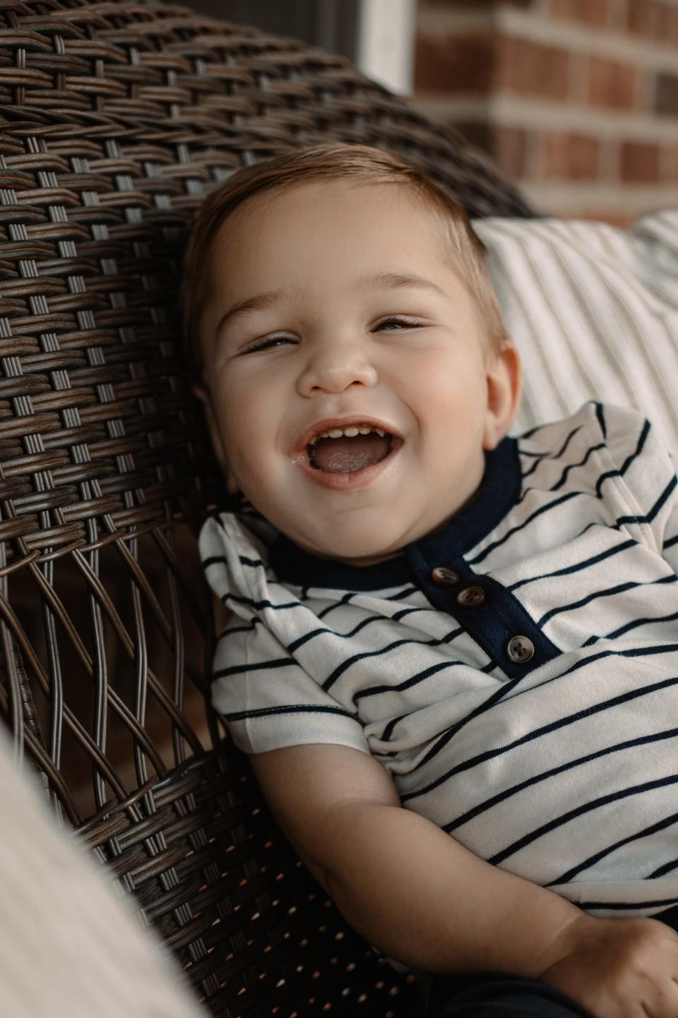 David Detwiler is all smiles during a recent photo session at the family's Massillon home.