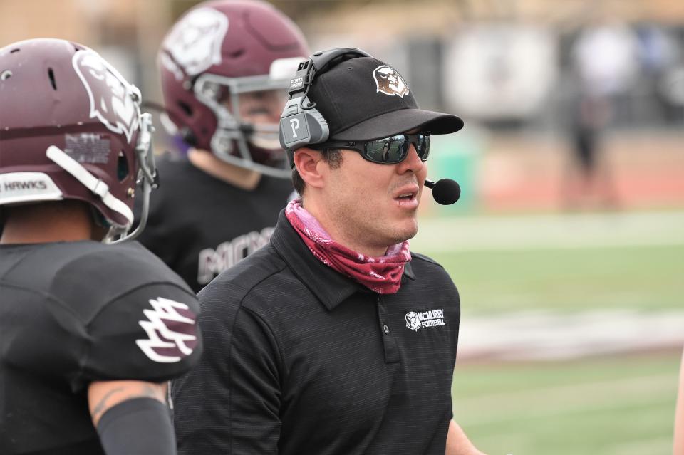 McMurry head coach Jordan Neal walks back to the sideline after a timeout during Saturday's game against Hardin-Simmons at Wilford Moore Stadium on Feb. 27, 2021. The Cowboys won 49-7.