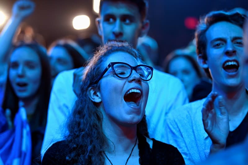 Fans react to the results at the election party of Bloc Quebecois leader Yves-Francois Blanchet in Montreal