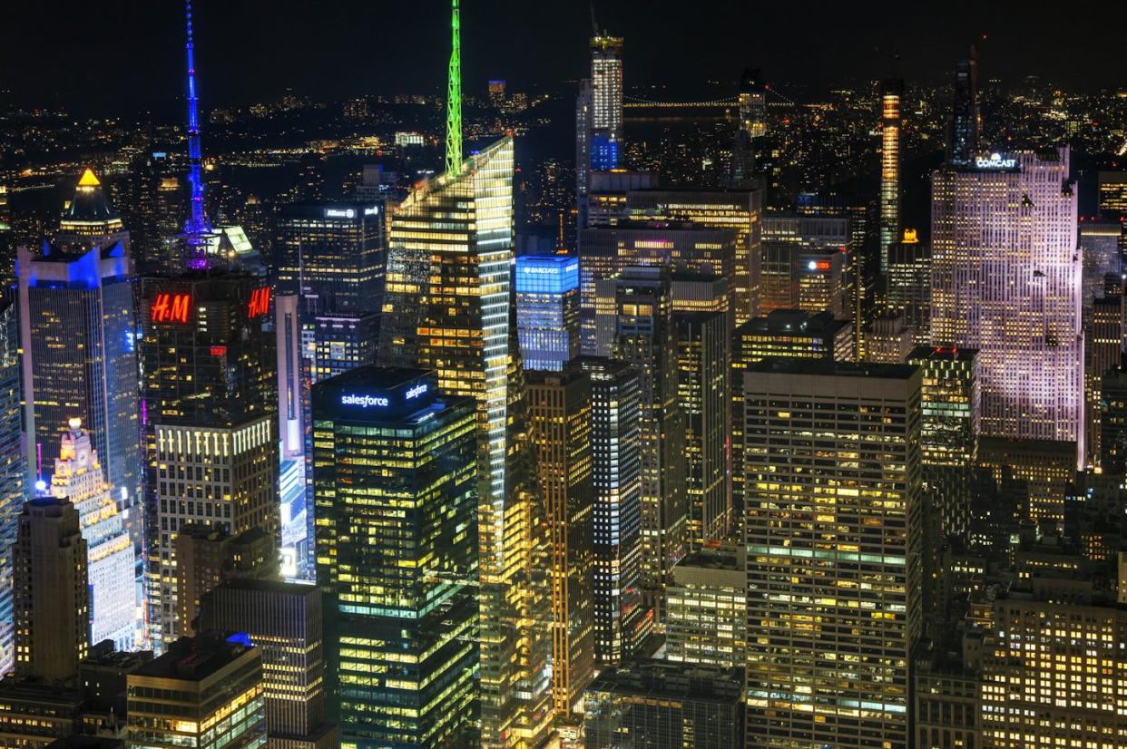 The New York City borough of Manhattan at night, viewed from the Rockefeller Center observation deck. <a href="https://www.gettyimages.com/detail/news-photo/manhattan-skyline-with-view-to-empire-state-building-from-news-photo/1749117051" rel="nofollow noopener" target="_blank" data-ylk="slk:Sergi Reboredo/VW Pics/Universal Images Group via Getty Images;elm:context_link;itc:0;sec:content-canvas" class="link ">Sergi Reboredo/VW Pics/Universal Images Group via Getty Images</a>