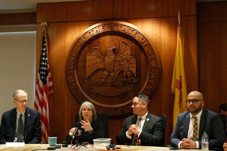 New Mexico Gov. Michelle Lujan Grisham, center left, discusses legislative accomplishments on Saturday, March 18, 2023, in Santa Fe, N.M. New Mexico's Legislature approved a $1.1 billion tax relief package at the close of its annual session as lawmakers tapped a financial windfall from oil production in efforts to break through entrenched cycles of poverty. National tensions over voting rights, abortion access and gun safety were on prominent display during a 60-day legislative session.