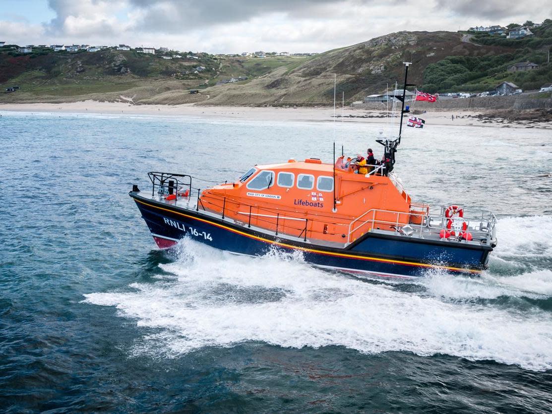 Lifeboat crews said the boy had done exactly what everyone should do when swept out to sea: Getty