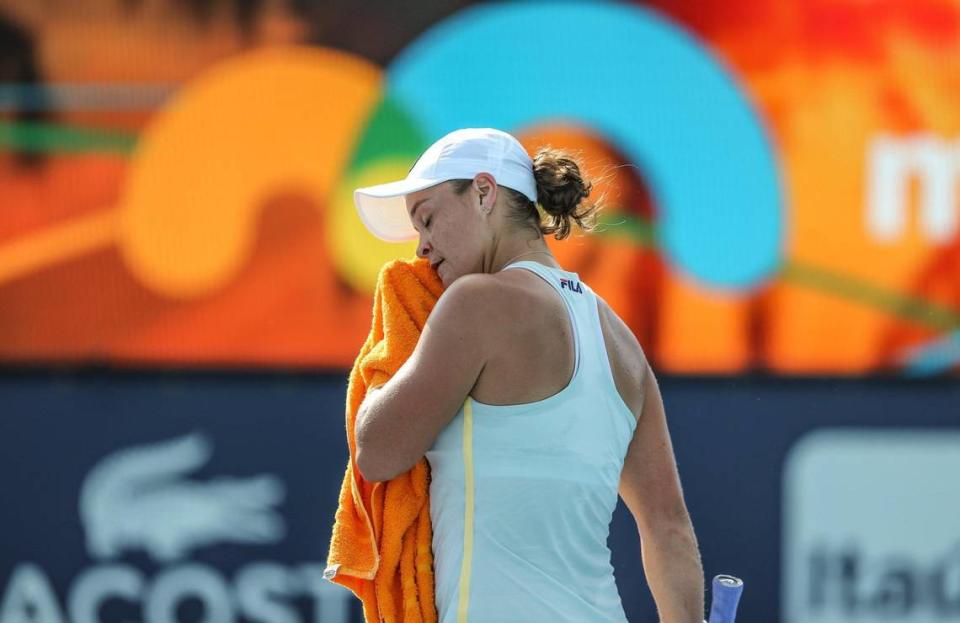 Ashleigh Barty wipes the sweat off her face between sets during a match against Kristina Kucova at the Miami Open at Hard Rock Stadium in Miami Gardens on Thursday, March 25, 2021.