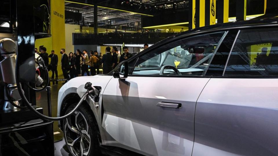 A Lotus Eletre is charged at the company's stand during the 20th Shanghai International Automobile Industry Exhibition in Shanghai on April 18, 2023.