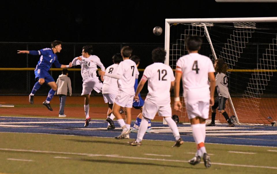 Jesus Angel Avila heads in a corner kick for Fillmore in its 1-0 win over Santa Paula in a Citrus Coast League match on Wednesday, Dec. 13, 2023.