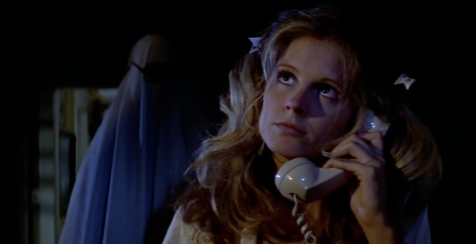 Lynda (Soles) makes her final phone call before becoming one of Michael Myers's victims in the original Halloween (Photo: Compass International Pictures/YouTube)