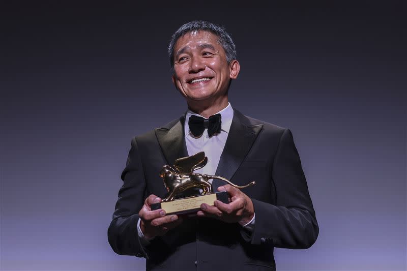 梁朝偉是第一位華人演員獲頒金獅獎終身成就獎。（圖／美聯社／達志影像）