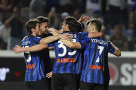 Atalanta's players after Charles De Ketelaere scored during the Serie A soccer match between Atalanta and Roma at the Gewiss Stadium in Bergamo, Italy, Sunday, May 12, 2024. (Spada/LaPresse via AP)