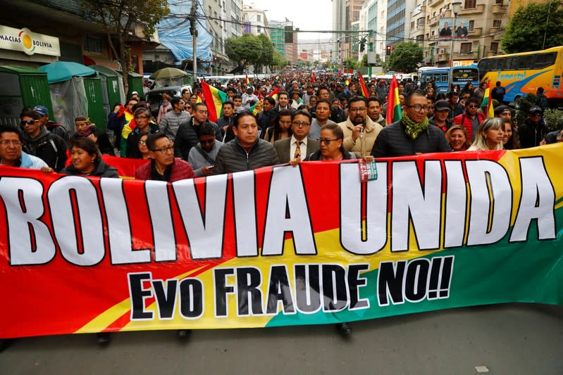 Demonstrators participate in a protest in La Paz