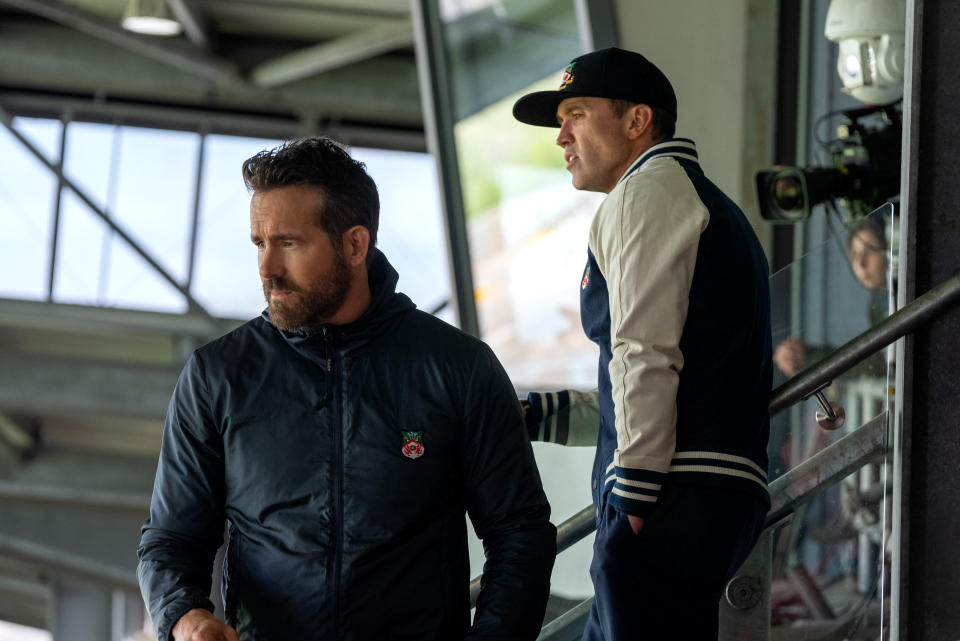 Ryan Reynolds and Rob McElhenney watch on as their team Wrexham AFC attempt to gain promotion in Welcome To Wrexham S2. (Disney+)