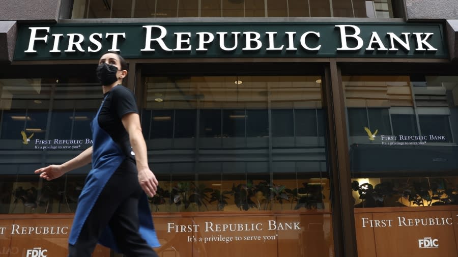 <sub>A person walks by the First Republic Bank headquarters on March 13, 2023 in San Francisco, California. (Photo by Justin Sullivan/Getty Images)</sub>