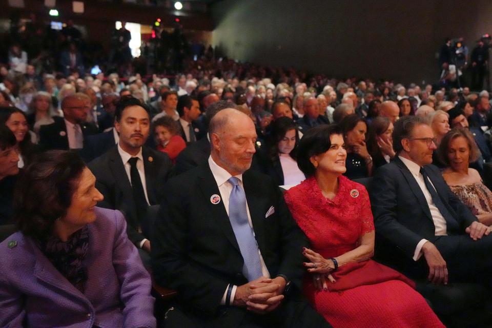 Luci Baines Johnson and Bryan Cranston attend President Joe Biden's address at the LBJ Presidential Library commemorating the 60th anniversary of the Civil Rights Act Monday, July 29, 2024, in Austin.