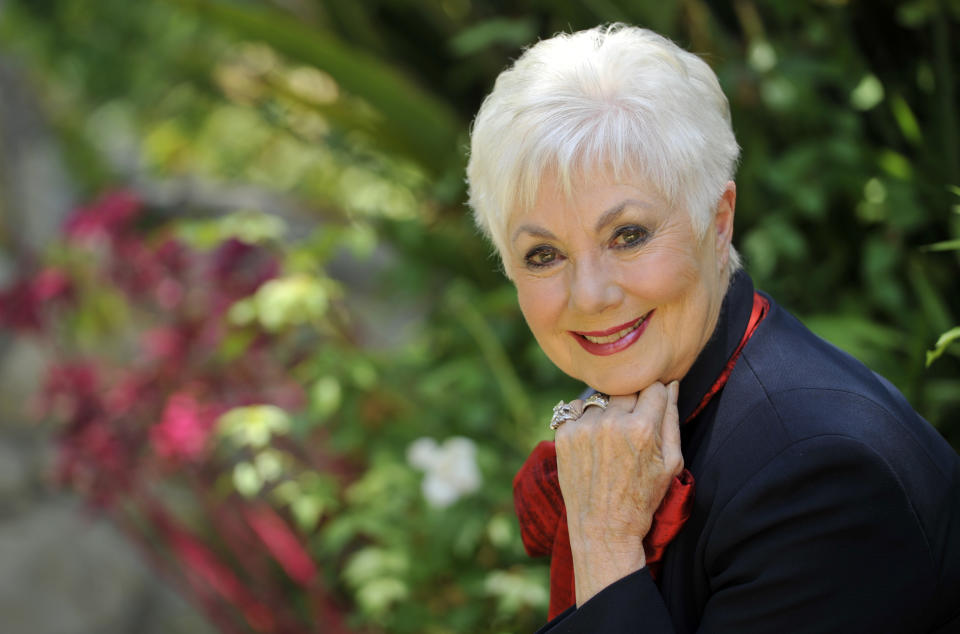 In this Monday, July 15, 2013 photo, actress Shirley Jones poses for a portrait at her home in Los Angeles. Jones’ autobiography, “Shirley Jones,” is being released Tuesday, July 23. (Photo by Chris Pizzello/Invision/AP)