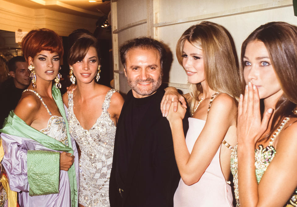 <p>Gianni Versace surrounded by Evangelista, Christy Turlington, Claudia Schiffer and Carla Bruni at a show in Paris in 1991. </p> <p>In September 2017, in a flashback to the '90s supermodel era, <a href="https://people.com/style/supermodels-reunite-at-versace-in-gold-gowns/" rel="nofollow noopener" target="_blank" data-ylk="slk:Cindy Crawford, Claudia Schiffer, Helena Christensen and Naomi Campbell suddenly reunited on the Versace runway;elm:context_link;itc:0;sec:content-canvas" class="link ">Cindy Crawford, Claudia Schiffer, Helena Christensen and Naomi Campbell suddenly reunited on the Versace runway</a>. Evangelista was noticeably absent, retreating from the spotlight as she endured physical and emotional pain in the aftermath of <a href="https://people.com/style/linda-evangelista-shares-first-photos-of-her-body-since-fat-freezing-nightmare-people-exclusive/" rel="nofollow noopener" target="_blank" data-ylk="slk:her 2015 cosmetic surgery nightmare;elm:context_link;itc:0;sec:content-canvas" class="link ">her 2015 cosmetic surgery nightmare</a>. </p>  