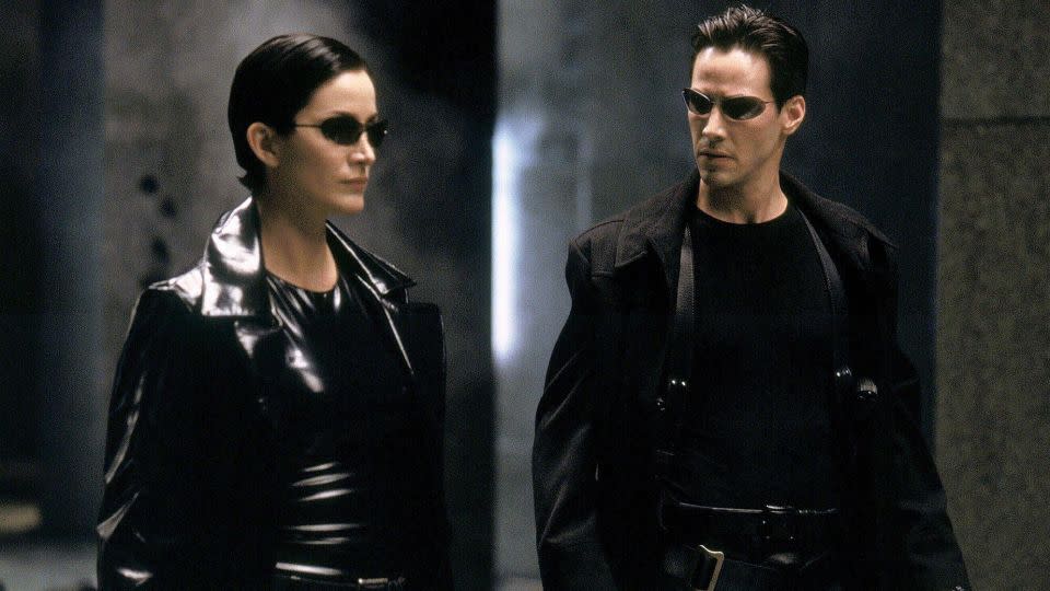 Carrie-Ann Moss and Keanu Reeves's styling in "The Matrix" has been endlessly replicated. - Maximum Film/Alamy Stock Photo