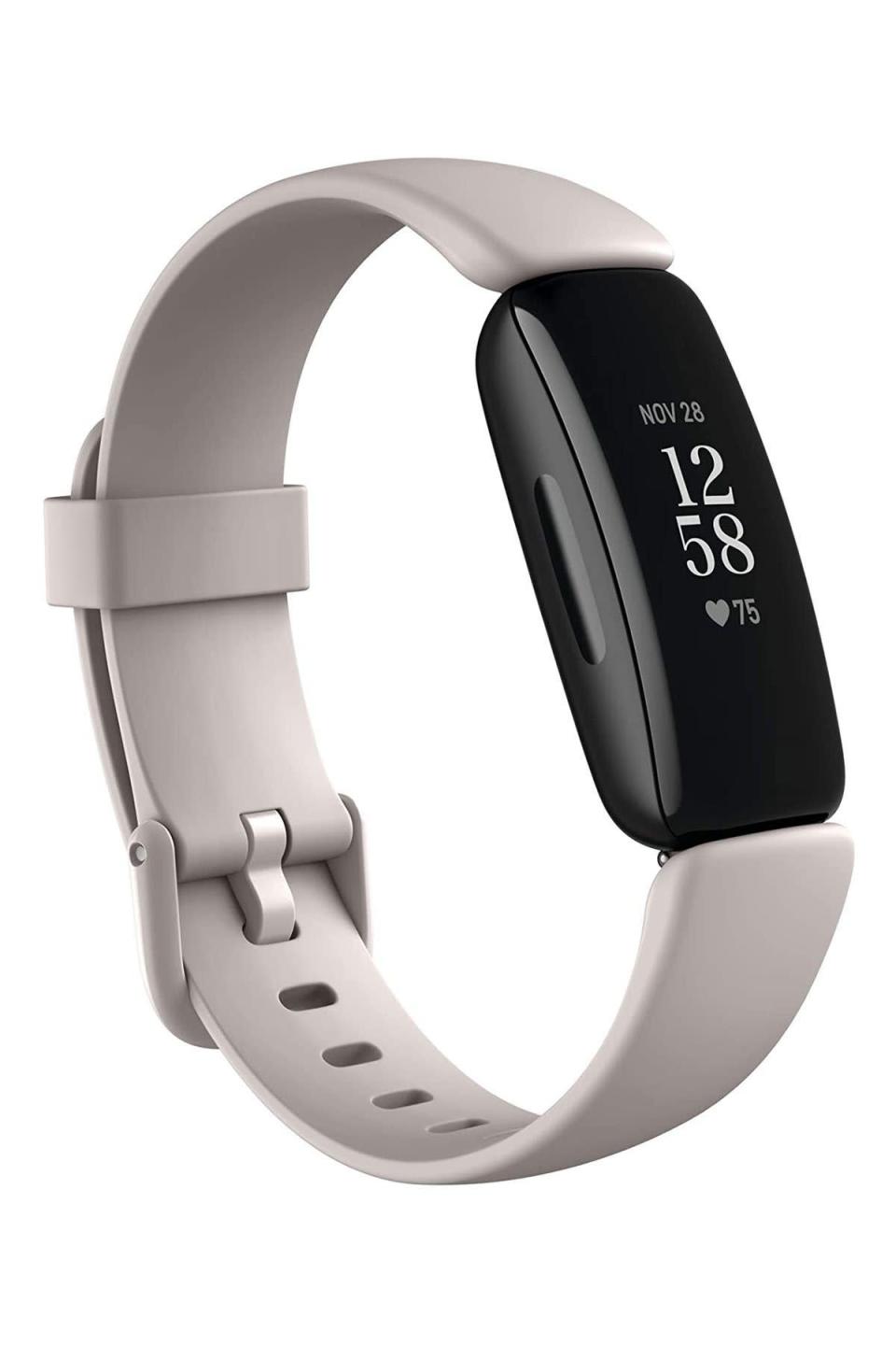 <p><strong>Fitbit</strong></p><p>amazon.com</p><p><strong>$86.99</strong></p><p><a href="https://www.amazon.com/dp/B08DFGC8YG?tag=syn-yahoo-20&ascsubtag=%5Bartid%7C10049.g.38592850%5Bsrc%7Cyahoo-us" rel="nofollow noopener" target="_blank" data-ylk="slk:Shop Now" class="link ">Shop Now</a></p><p>If they spend most of the day on their feet (or they like to get in a good workout after they clock out), they'll definitely appreciate a fitness tracker. The Fitbit Inspire 2 tracks their activity level, their heart rate, and their sleep. Plus, it's also waterproof. </p>