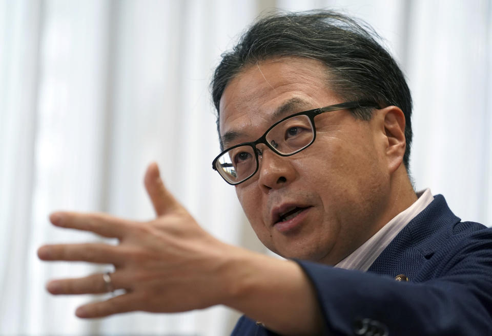 Japan’s Trade Minister Hiroshige Seko speaks during an exclusive interview with The Associated Press at his office in Tokyo Thursday, Aug. 23, 2018. Seko criticized President Donald Trump’s tariff policies as based on a serious misunderstanding about the importance of free trade and the contributions of Japanese companies to the U.S. economy. (AP Photo/Eugene Hoshiko)